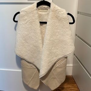 White fur and leather vest